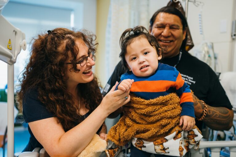 Parents with child at Boston Children's Hospital