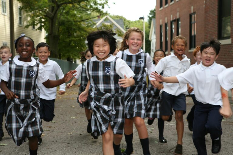 Students running in uniform